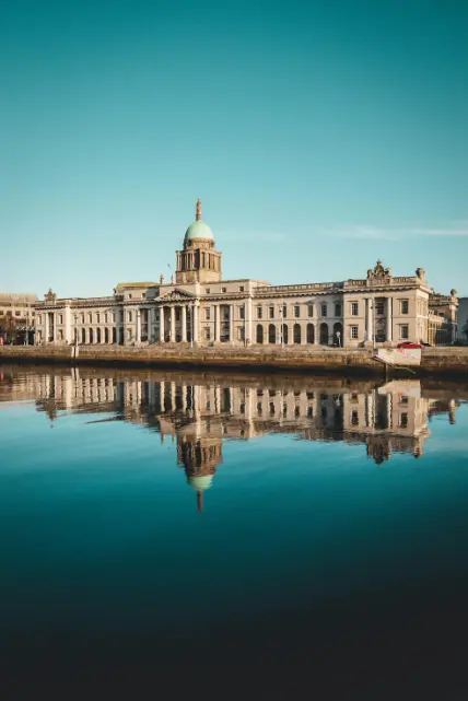 Shopping mall by the river in Ireland, showcasing urban design elements ideal for interior design projects in Ireland.